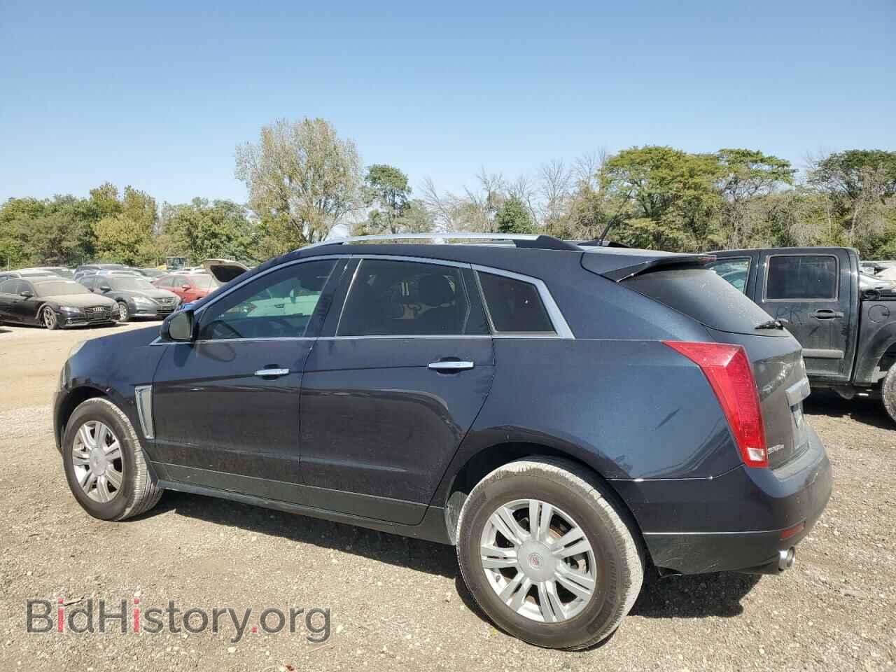 2014 CADILLAC SRX - VIN: 3GYFNEE31ES662045 - Фото 2