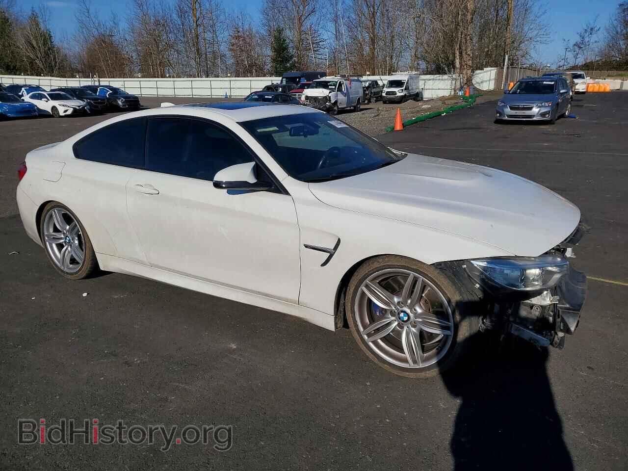 2015 BMW M4 - VIN: WBS3R9C55FK333931 - Фото 4