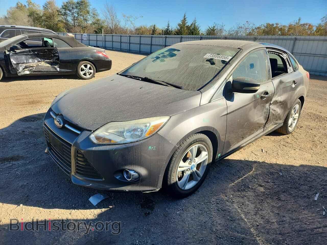 2012 Ford FOCUS SE (VIN 1FAHP3F20CL335972) — photo 1 of 12, Copart, damage: front end