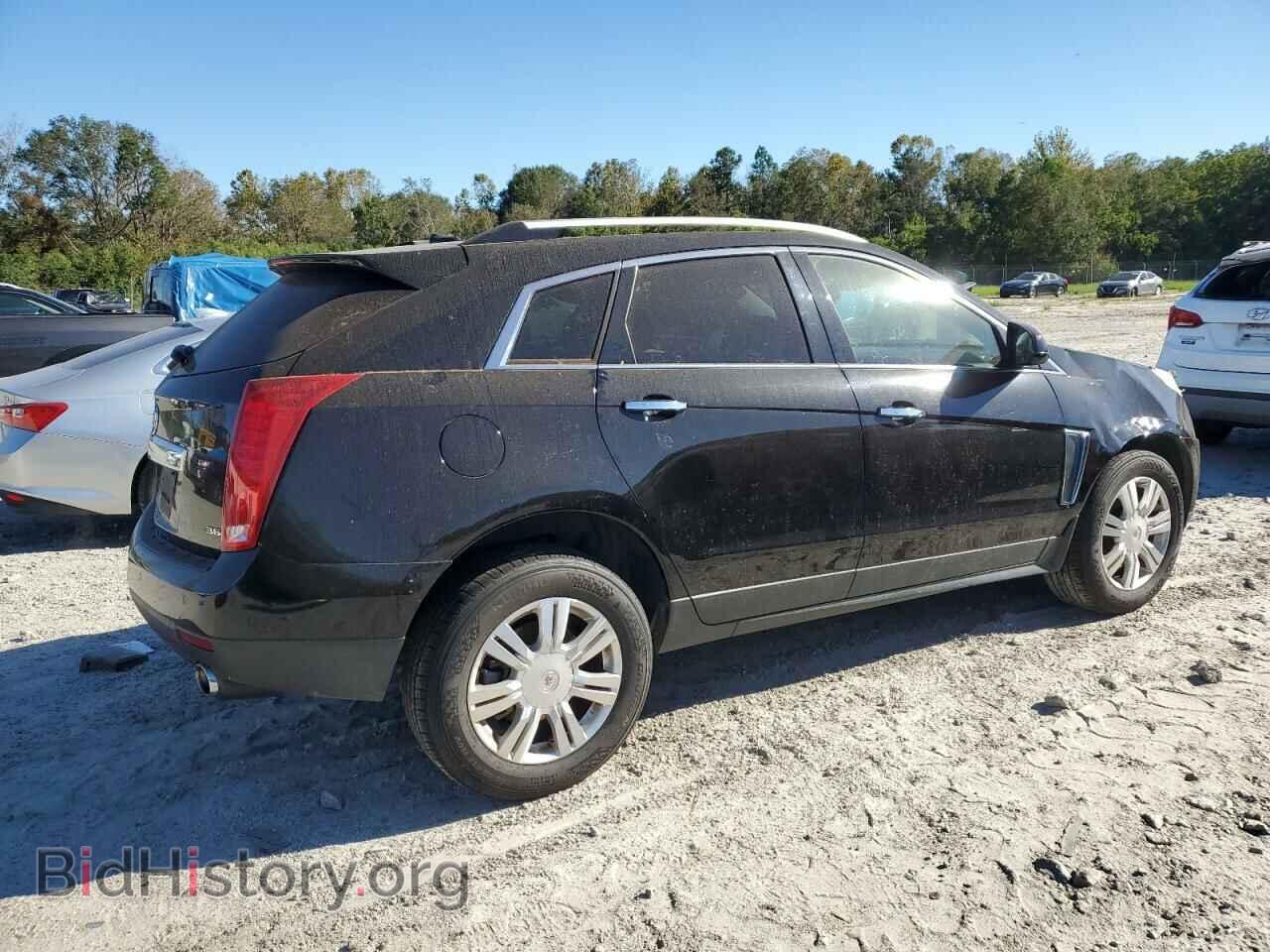 2013 CADILLAC SRX - VIN: 3GYFNCE35DS625048 - Фото 3