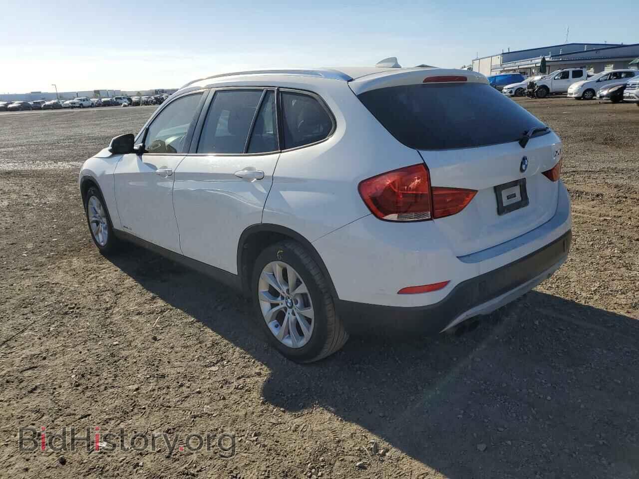 2014 BMW X1 - VIN: WBAVL1C59EVR92897 - Фото 2
