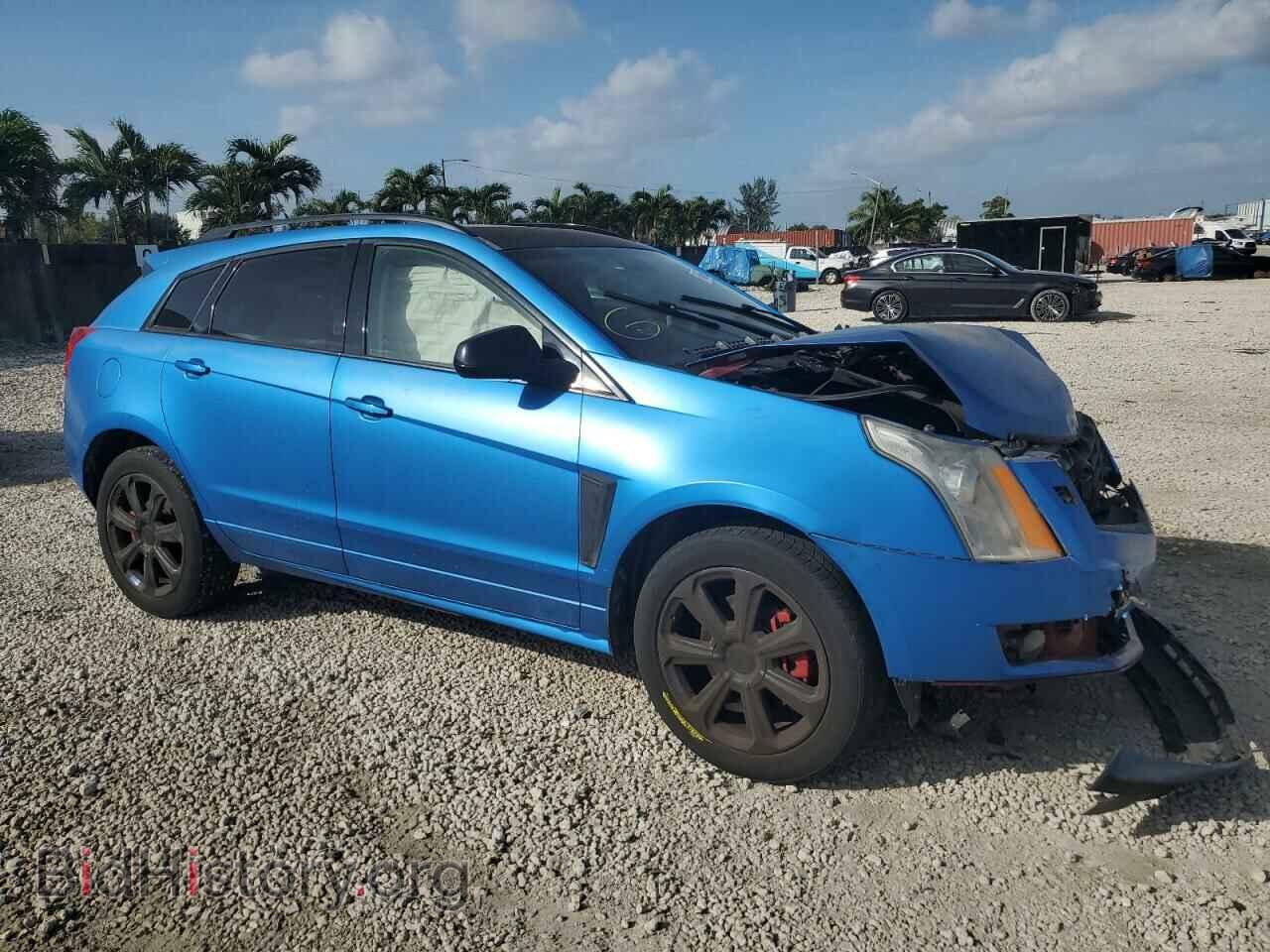 2014 CADILLAC SRX - VIN: 3GYFNCE3XES544290 - Фото 4