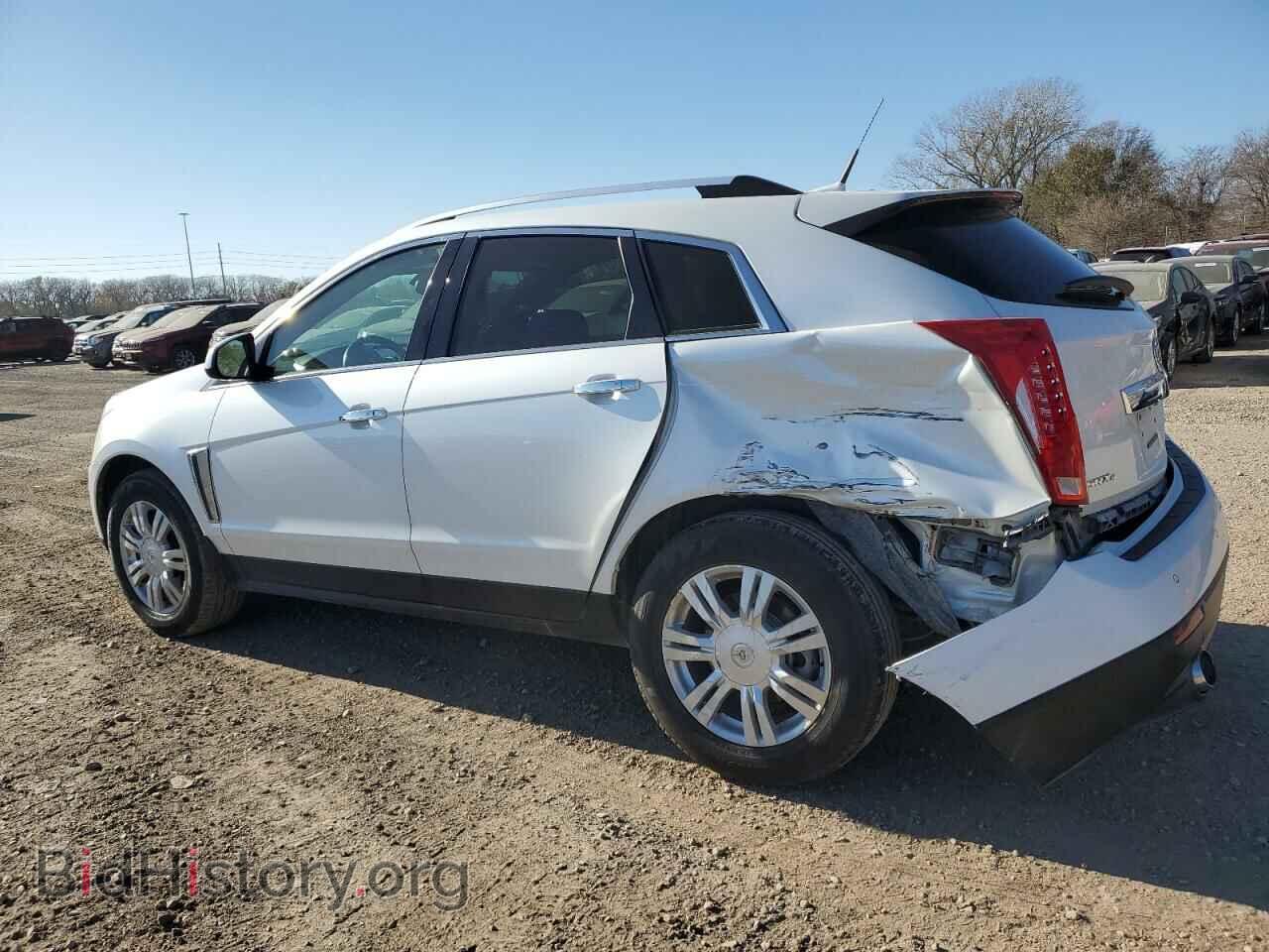 2014 CADILLAC SRX - VIN: 3GYFNEE35ES521589 - Фото 2