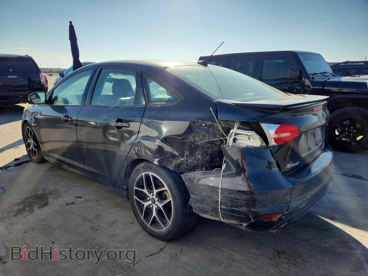 2016 FORD FOCUS - VIN: 1FADP3F27GL371694 - Фото 2