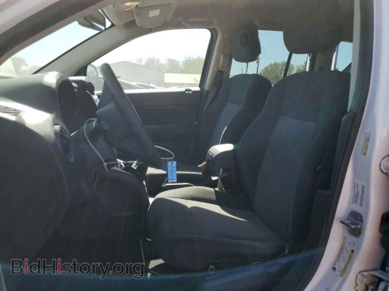 2011 Jeep COMPASS (VIN 1J4NF1FB0BD209957) — photo 7 of 13