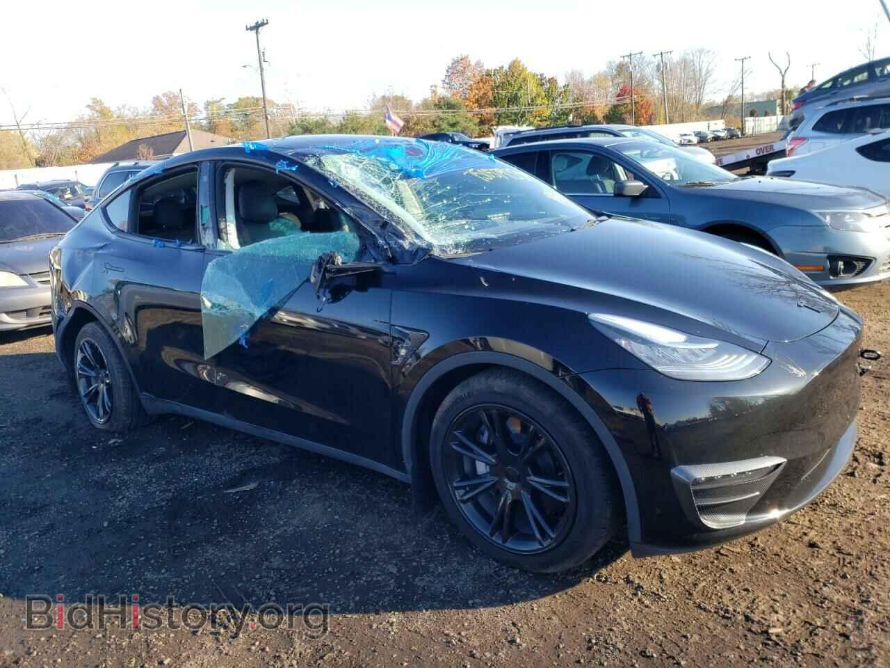 2023 TESLA MODEL Y - VIN: 7SAYGDEE2PF597063 - Фото 4