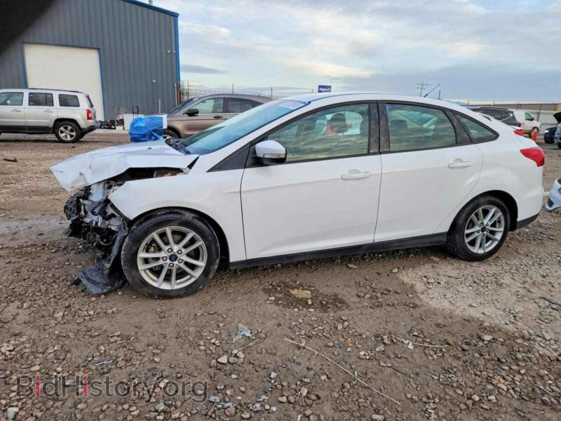 2015 Ford FOCUS SE (VIN 1FADP3F25FL207536) — photo 1 of 14, Copart, damage: front end