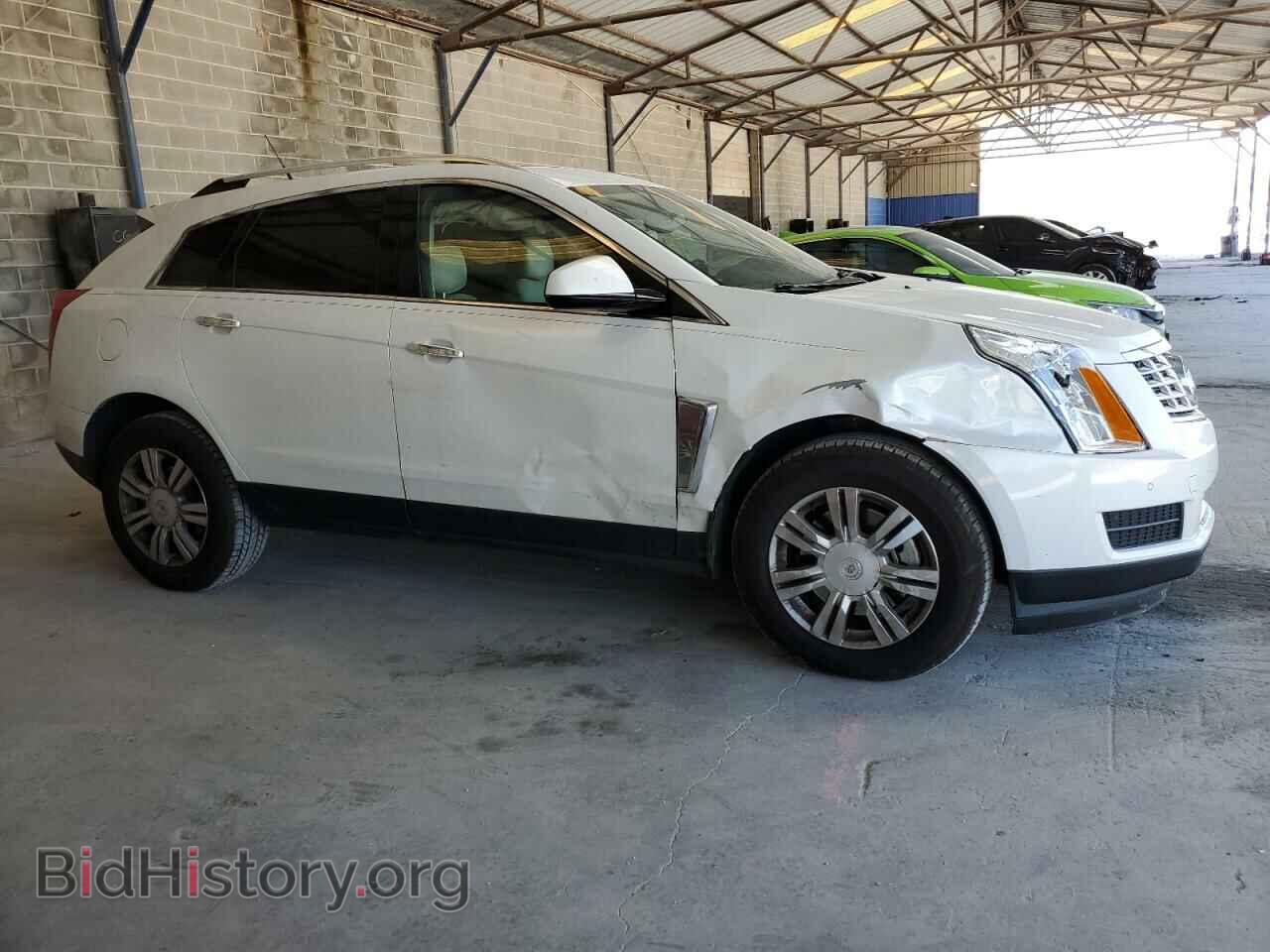 2013 CADILLAC SRX - VIN: 3GYFNCE3XDS521722 - Фото 4