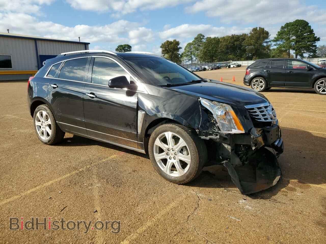 2014 CADILLAC SRX - VIN: 3GYFNDE37ES643218 - Фото 4
