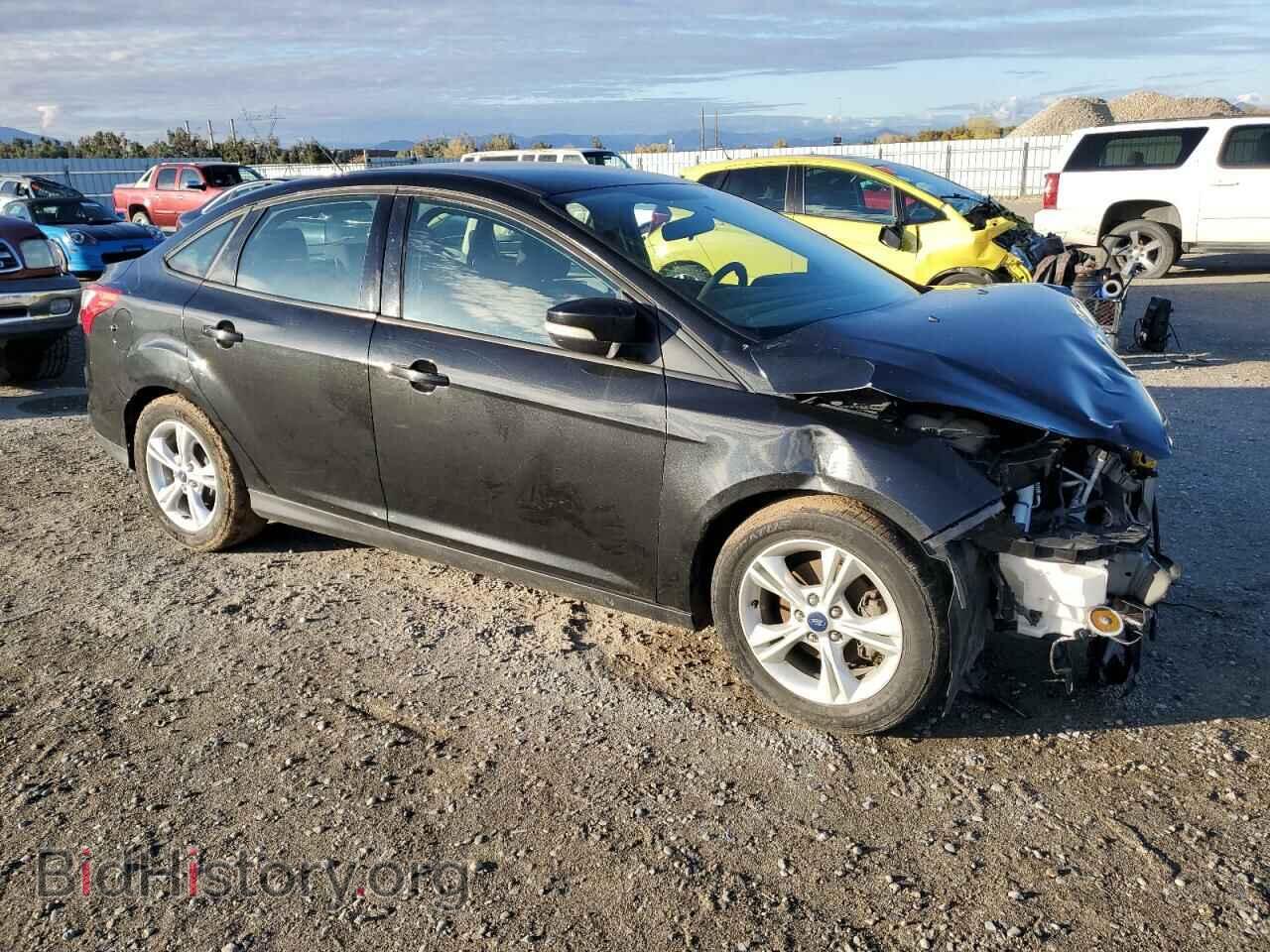 2014 FORD FOCUS - VIN: 1FADP3F2XEL462004 - Photo 4