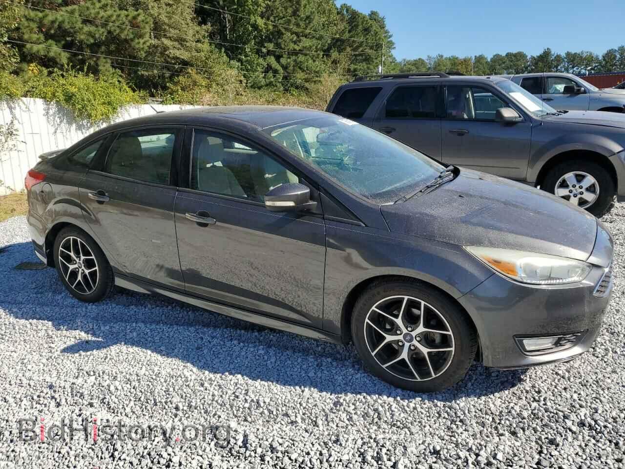 2015 FORD FOCUS - VIN: 1FADP3F20FL279664 - Photo 4