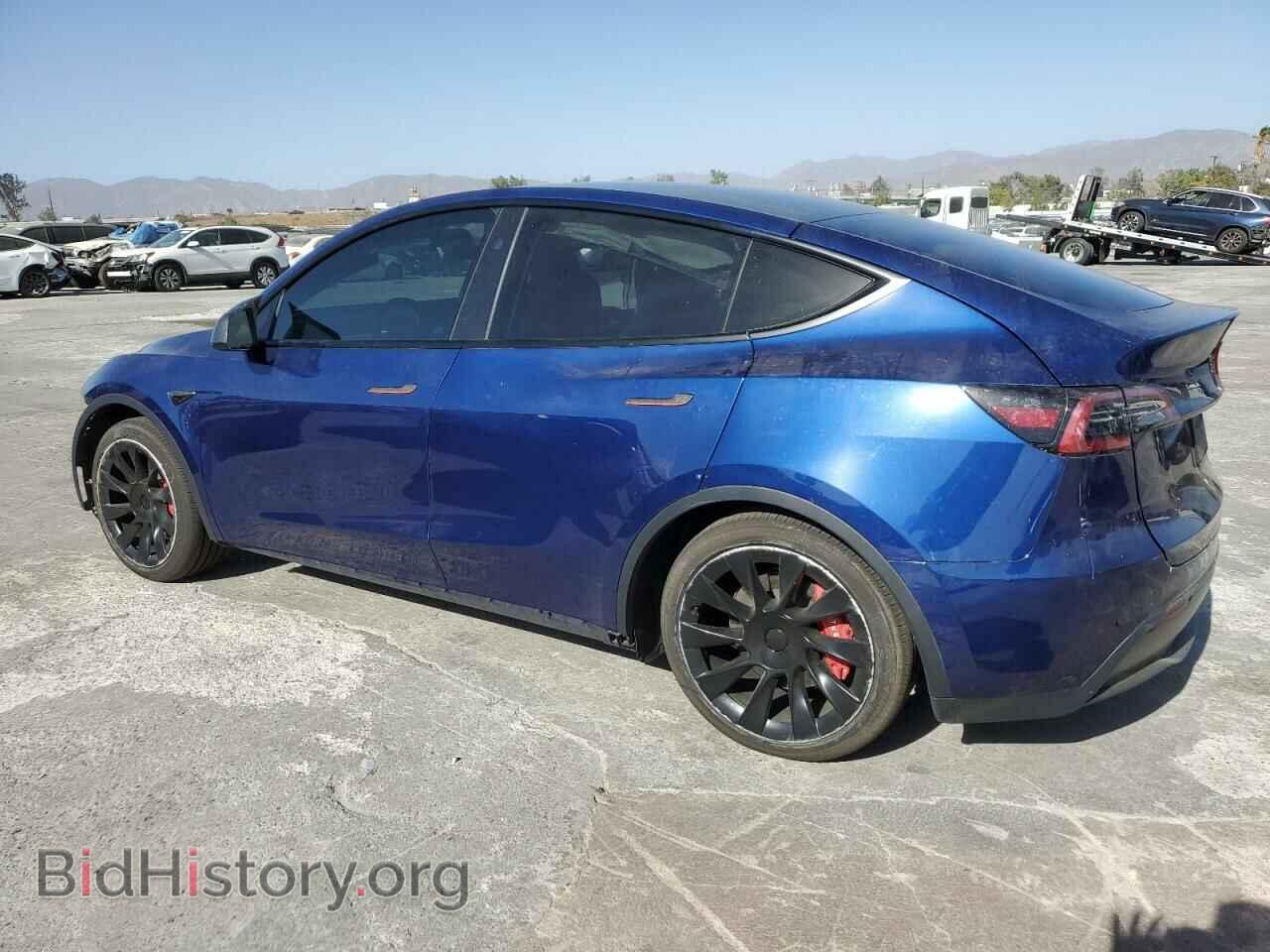 2023 TESLA MODEL Y - VIN: 7SAYGDED7PF977572 - Photo 2