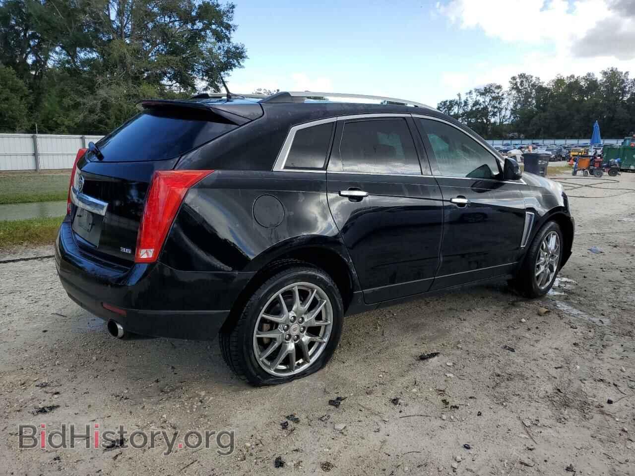 2014 CADILLAC SRX - VIN: 3GYFNDE3XES577148 - Фото 3