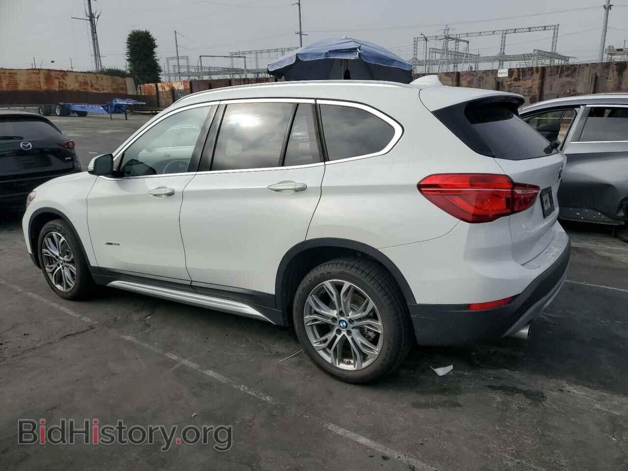 2017 BMW X1 - VIN: WBXHT3C39H5F77129 - Фото 2