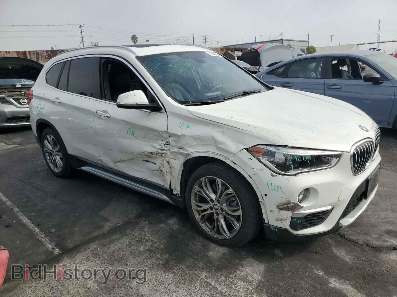 2017 BMW X1 - VIN: WBXHT3C39H5F77129 - Фото 4