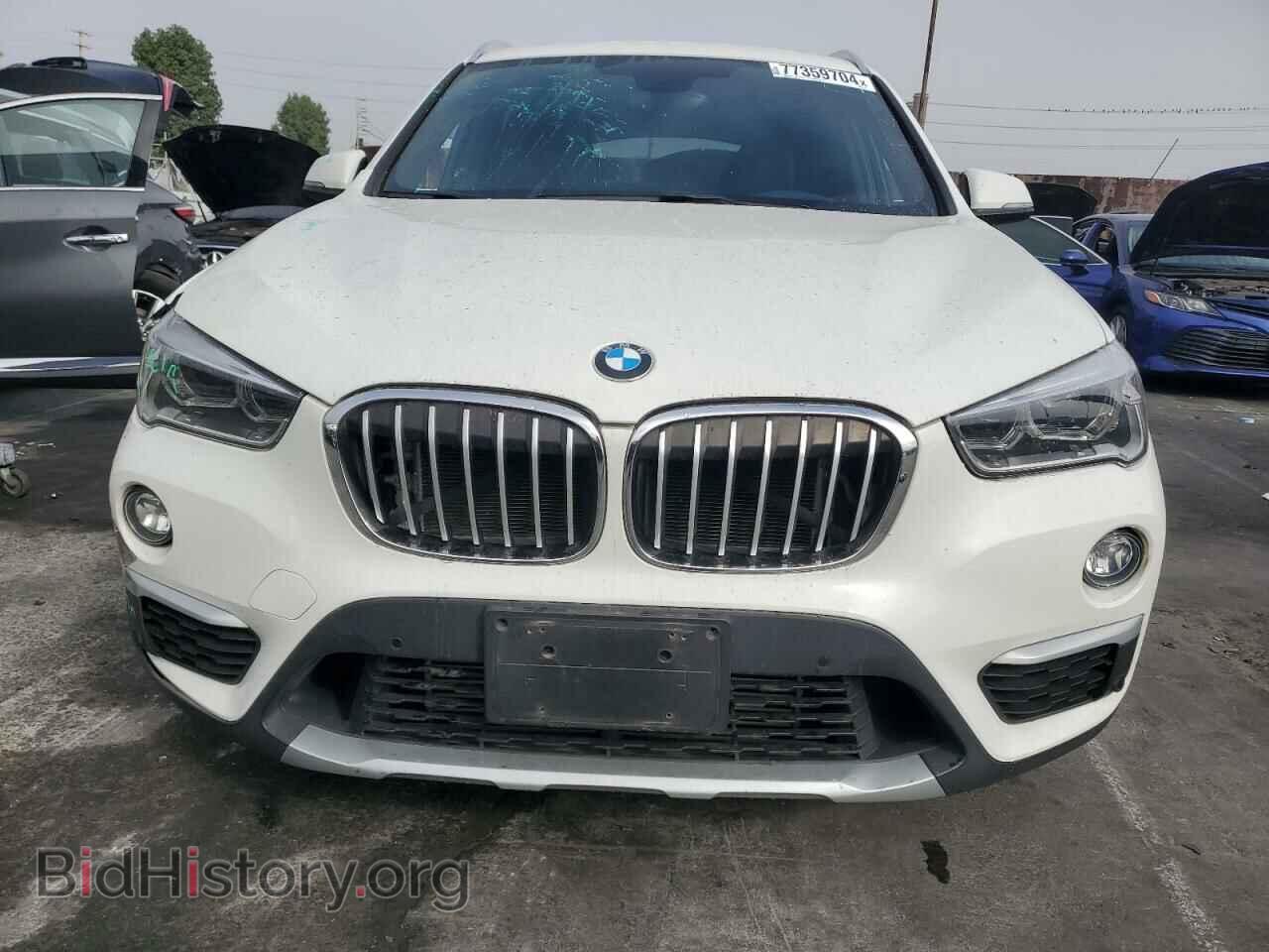 2017 BMW X1 - VIN: WBXHT3C39H5F77129 - Фото 5