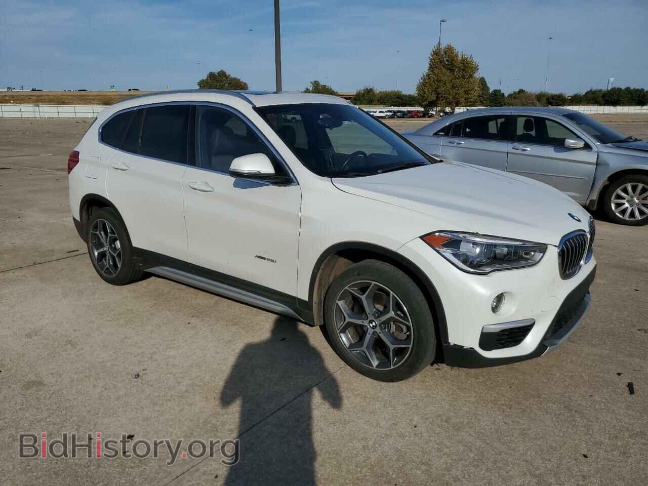 2017 BMW X1 - VIN: WBXHT3C36H5F73930 - Фото 4