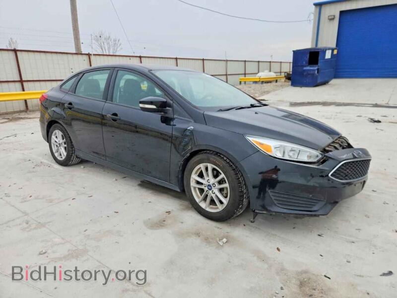 2016 Ford FOCUS (VIN 1FADP3F29GL348031) — photo 4 of 15