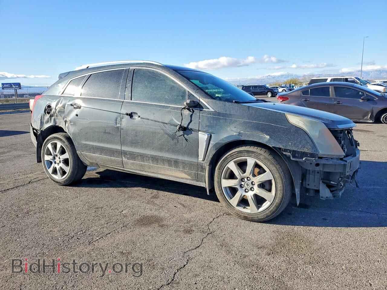 2014 CADILLAC SRX - VIN: 3GYFNCE38ES660927 - Фото 4