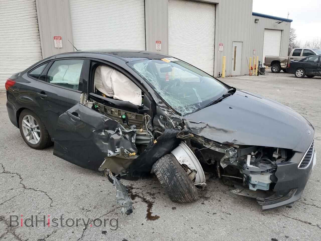 2017 FORD FOCUS - VIN: 1FADP3F23HL309419 - Photo 4