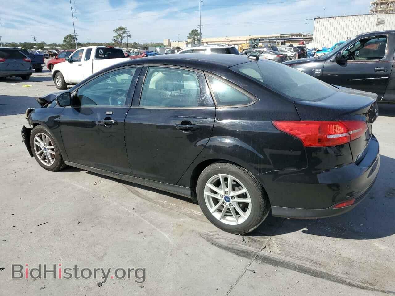 2016 FORD FOCUS - VIN: 1FADP3F28GL376497 - Фото 2