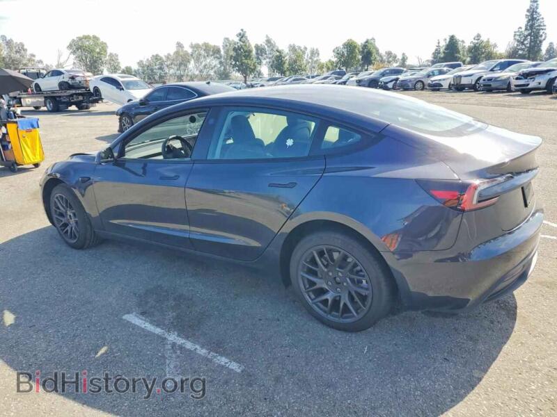 2025 Tesla MODEL 3 (VIN 5YJ3E1EAXSF878660) — photo 2 of 14