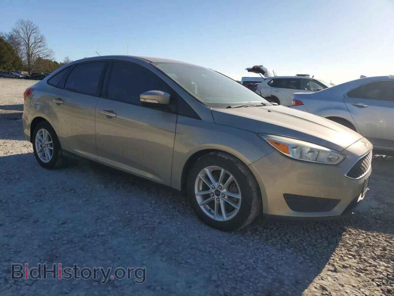 2015 Ford FOCUS (VIN 1FADP3F2XFL316400) — фото 4 из 12