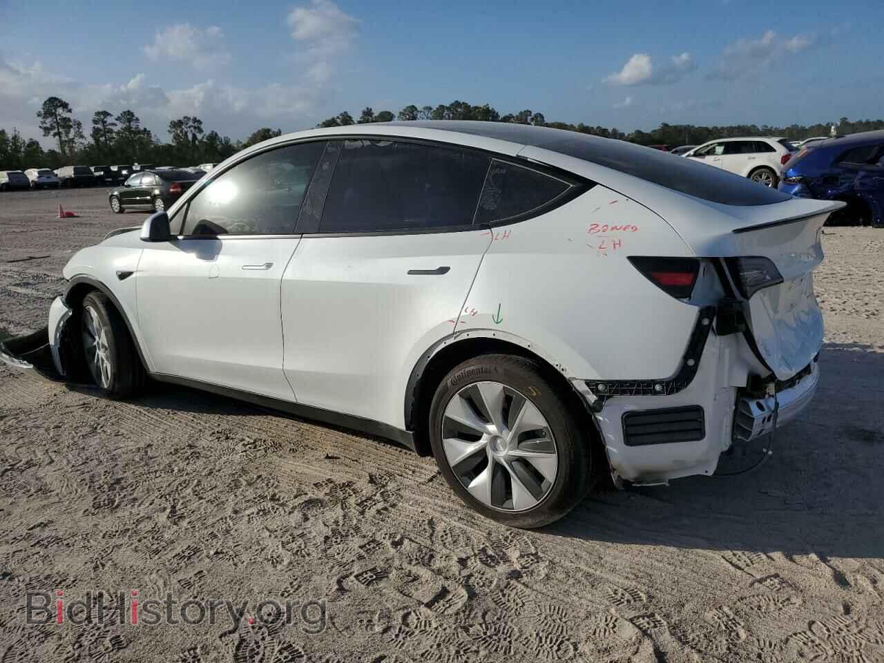 2023 TESLA MODEL Y - VIN: 7SAYGAEE4PF829614 - Фото 2