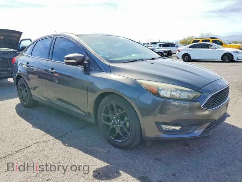 2016 Ford FOCUS (VIN 1FADP3F22GL325707) — photo 4 of 12