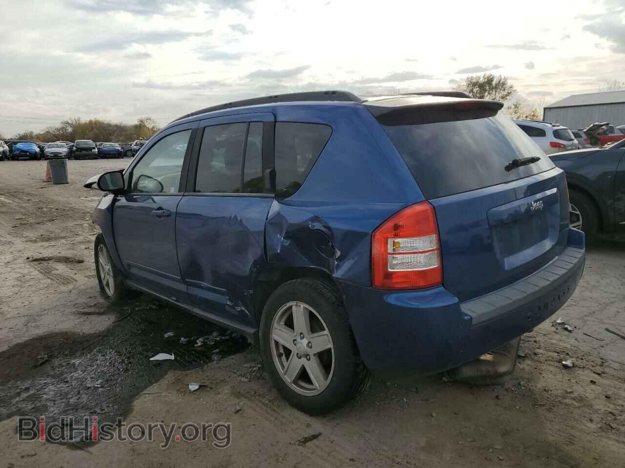 2010 JEEP COMPASS - VIN: 1J4NT4FA2AD525974 - Photo 2