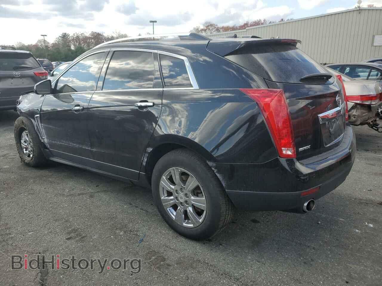 2014 CADILLAC SRX - VIN: 3GYFNBE39ES587917 - Фото 2