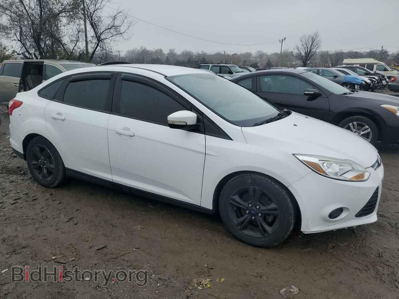 2014 FORD FOCUS - VIN: 1FADP3F24EL329691 - Photo 4