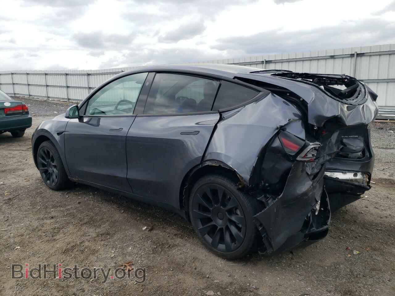 2023 TESLA MODEL Y - VIN: 7SAYGDEE7PF857196 - Фото 2