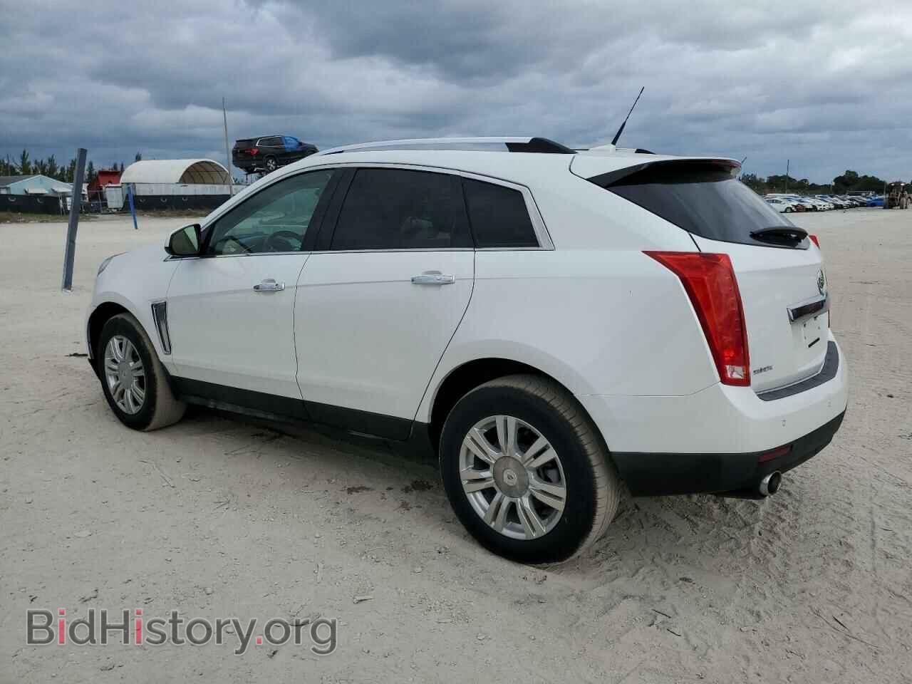 2013 CADILLAC SRX - VIN: 3GYFNCE33DS519472 - Фото 2