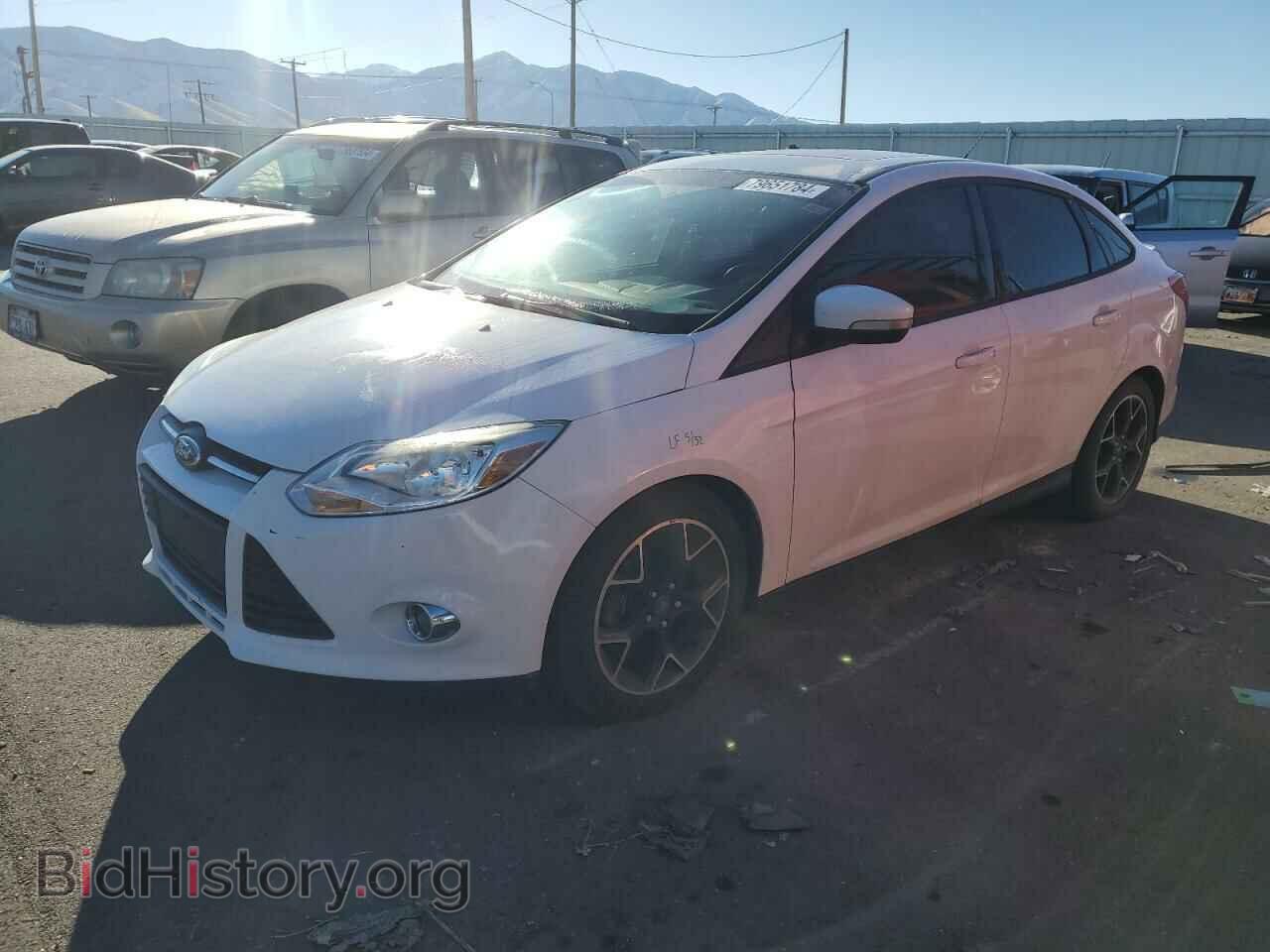 Фотография 1FADP3F27DL227039 - FORD FOCUS 2013