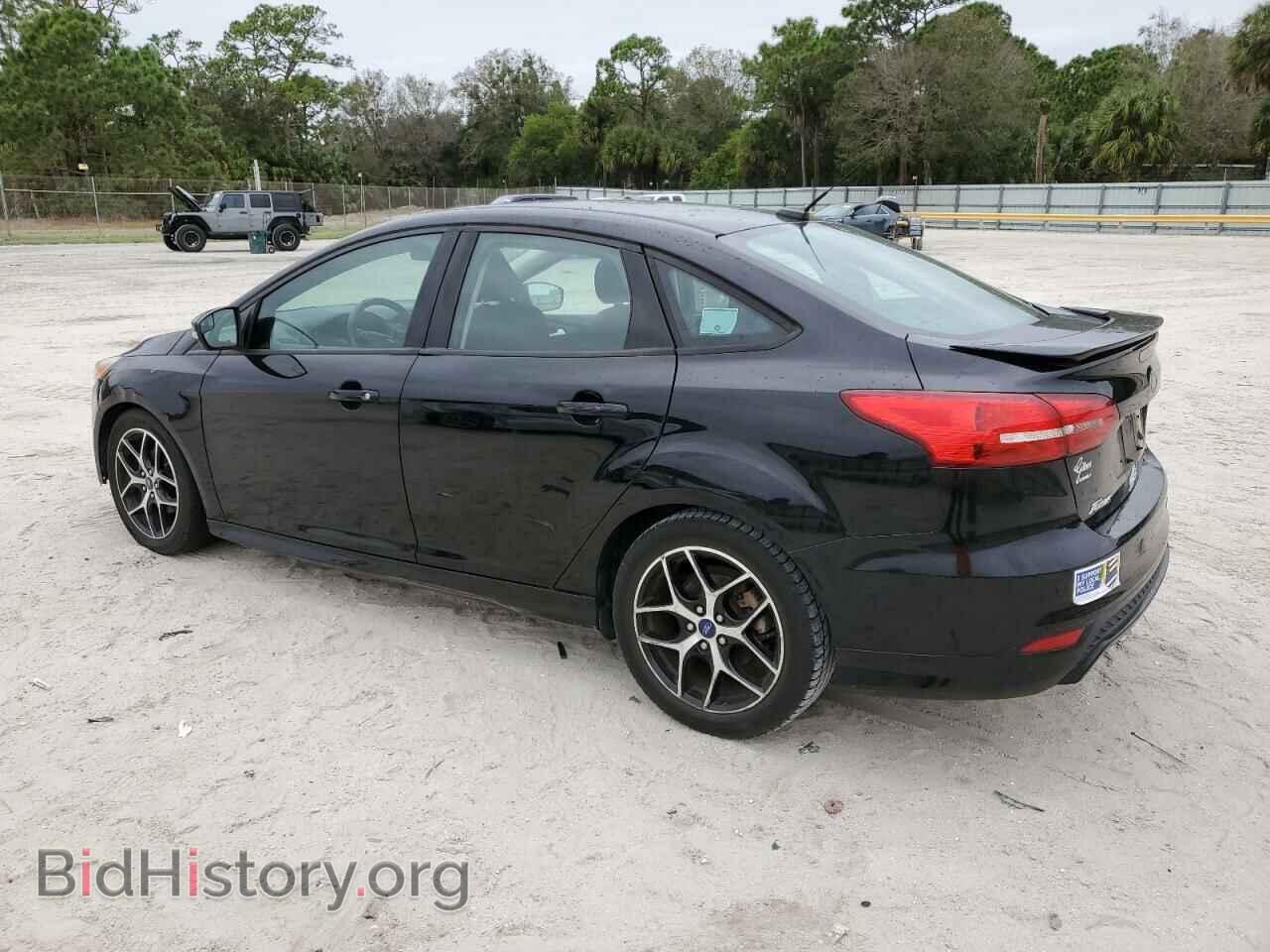 2016 FORD FOCUS - VIN: 1FADP3F21GL382061 - Photo 2