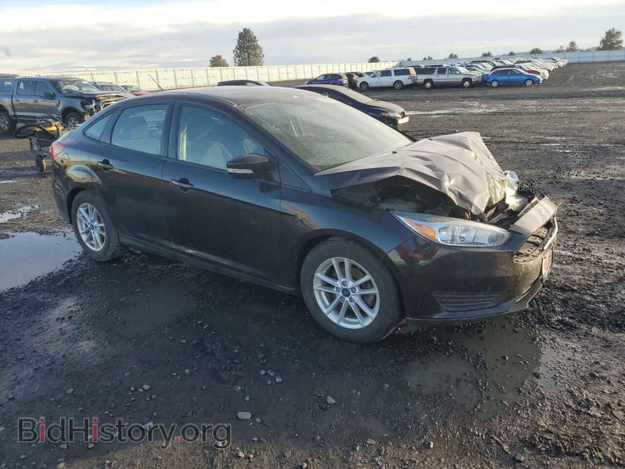 2015 FORD FOCUS - VIN: 1FADP3F2XFL370103 - Photo 4