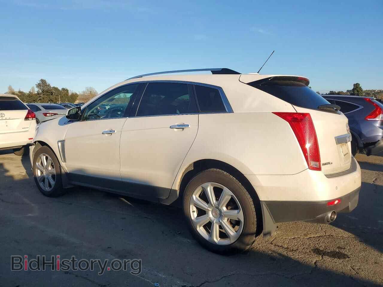 2016 CADILLAC SRX - VIN: 3GYFNDE33GS500348 - Фото 2