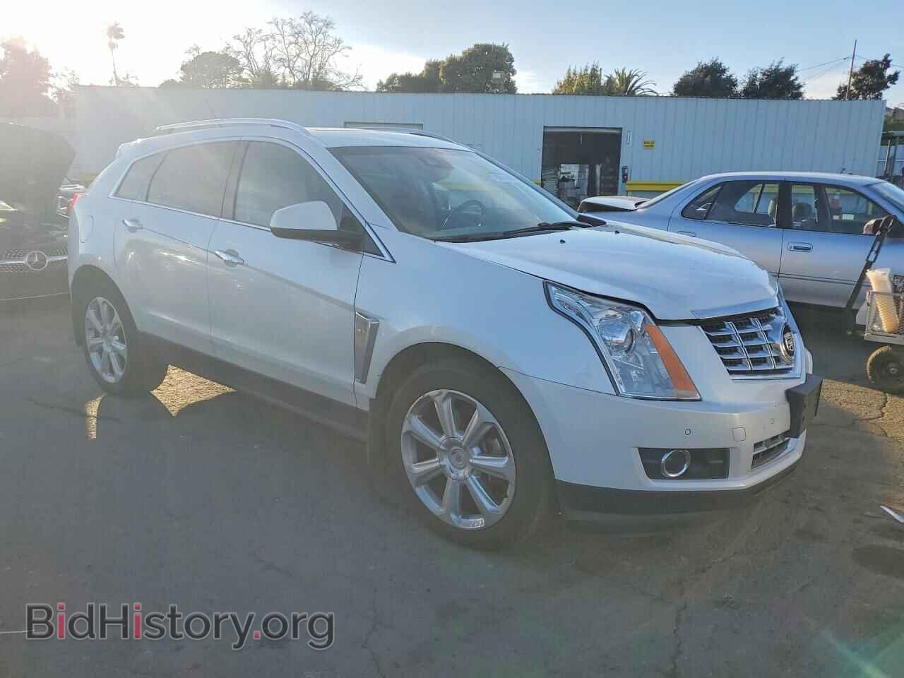 2016 CADILLAC SRX - VIN: 3GYFNDE33GS500348 - Фото 4