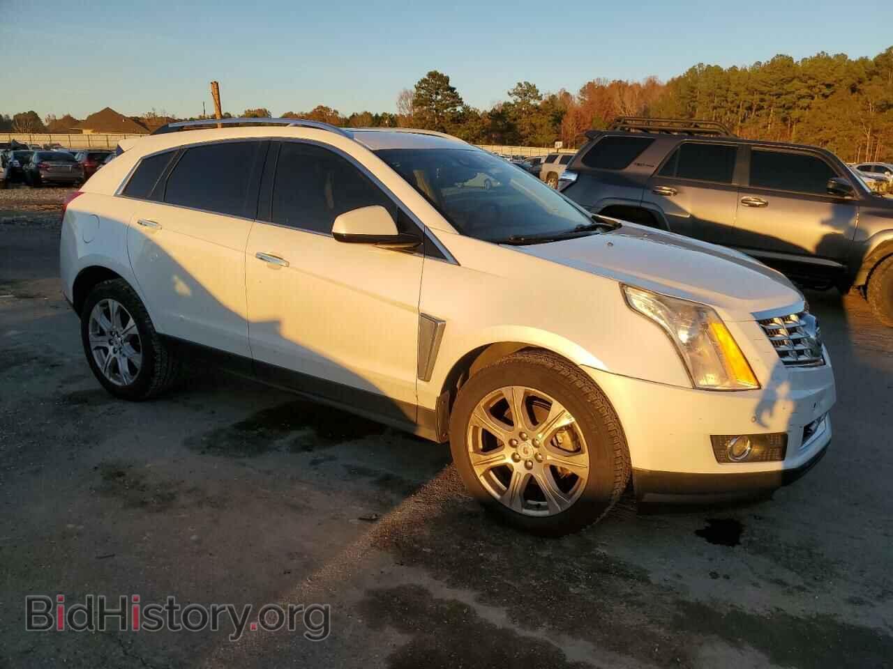 2014 CADILLAC SRX - VIN: 3GYFNCE37ES569440 - Photo 4