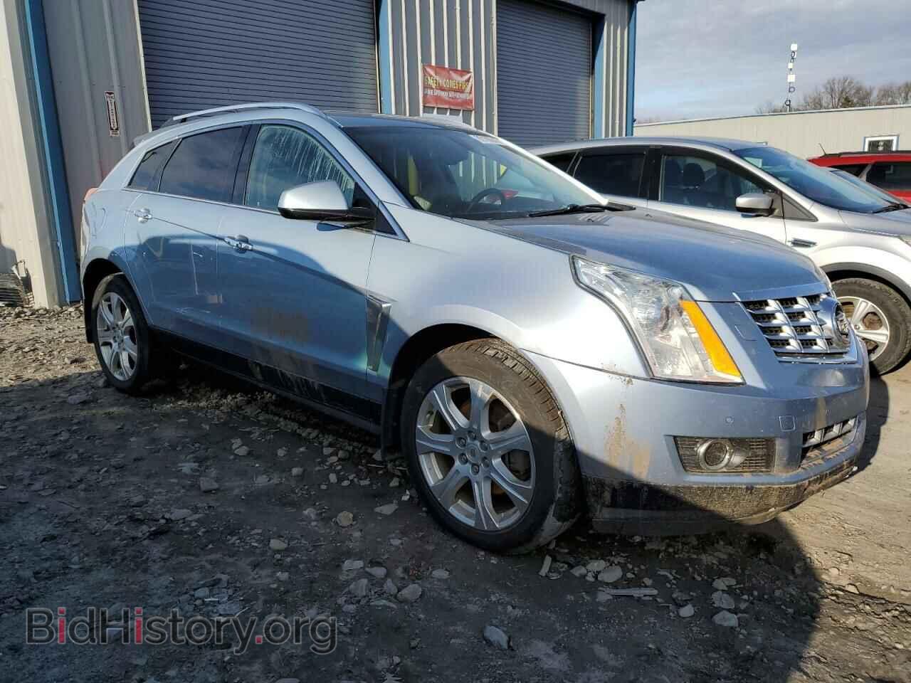 2014 CADILLAC SRX - VIN: 3GYFNCE3XES555046 - Фото 4