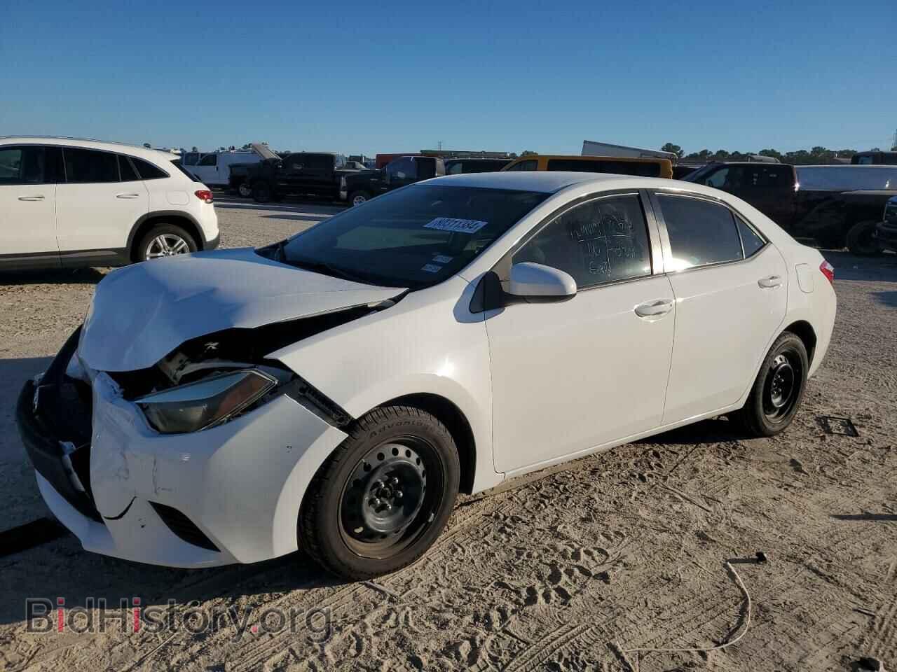 Фотография 5YFBURHEXEP174642 - TOYOTA COROLLA 2014