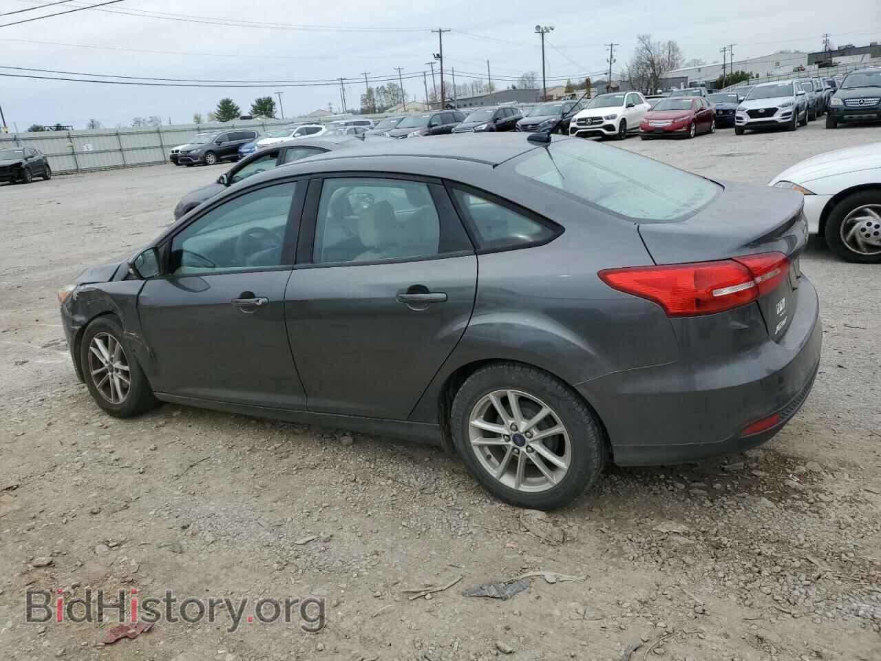 2016 FORD FOCUS - VIN: 1FADP3F21GL219202 - Фото 2