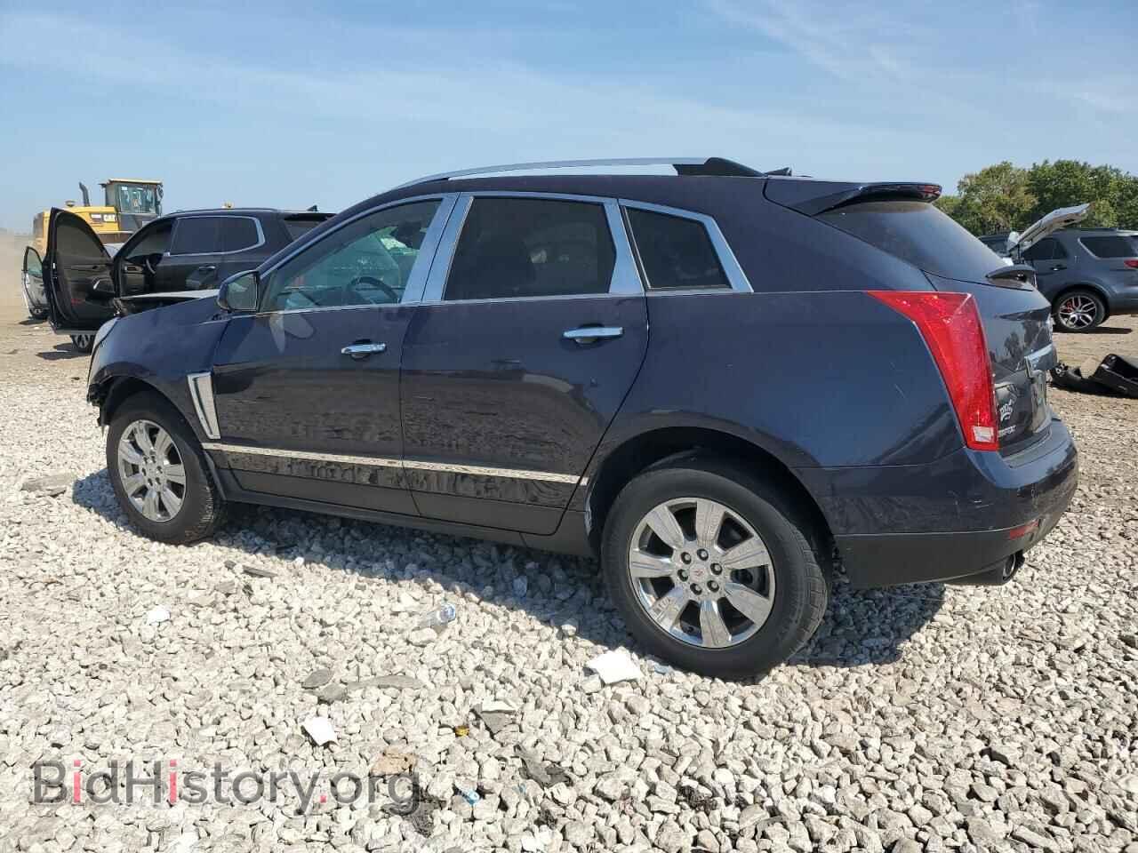 2014 CADILLAC SRX - VIN: 3GYFNBE31ES586759 - Фото 2