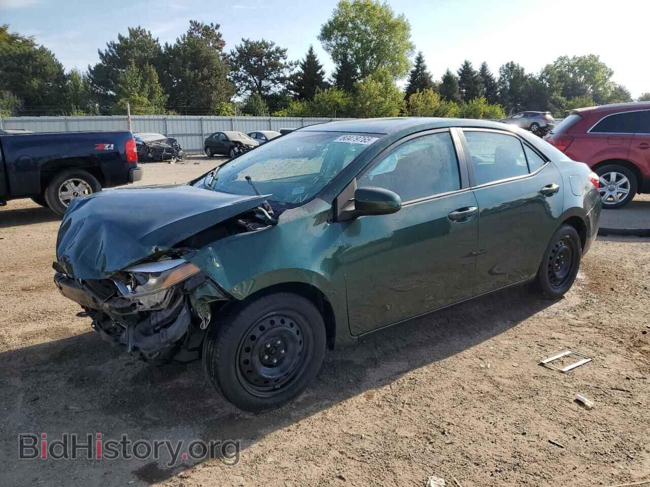 Фотография 5YFBURHEXEP091180 - TOYOTA COROLLA 2014