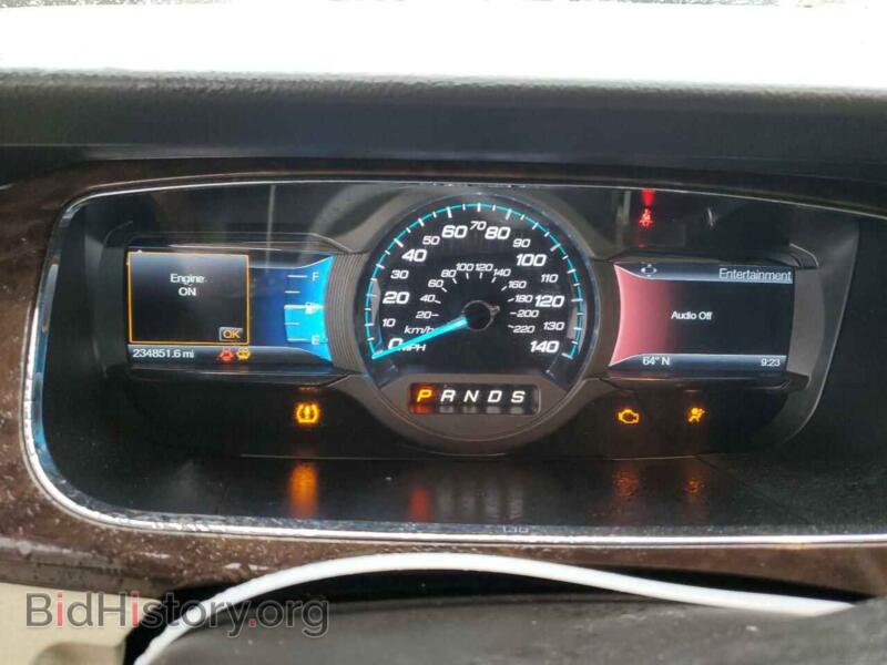 2015 Ford TAURUS (VIN 1FAHP2F8XFG104881) — photo 9 of 12