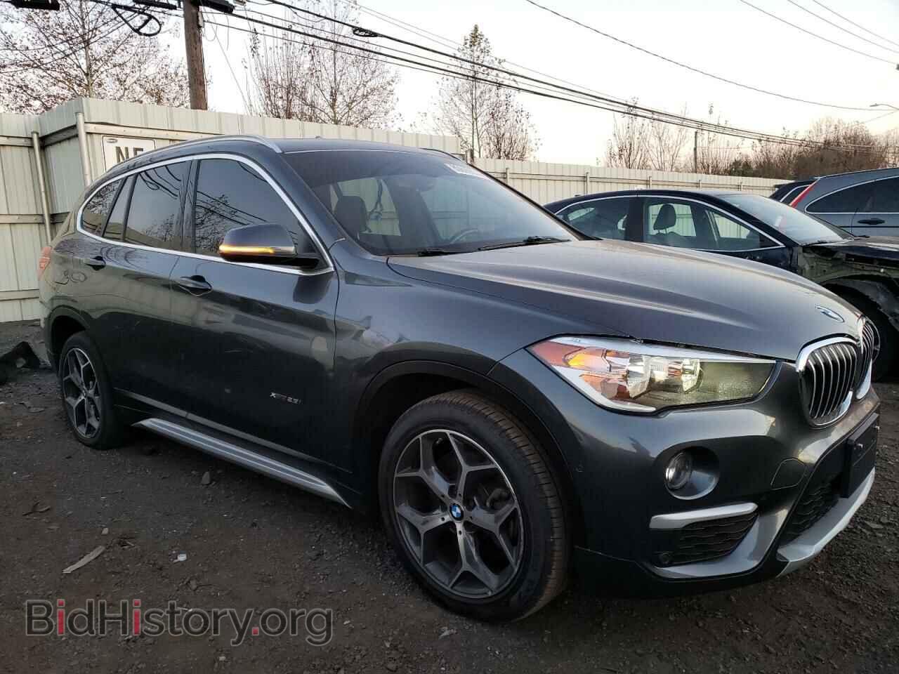 2017 BMW X1 - VIN: WBXHT3C37H5F70552 - Фото 4