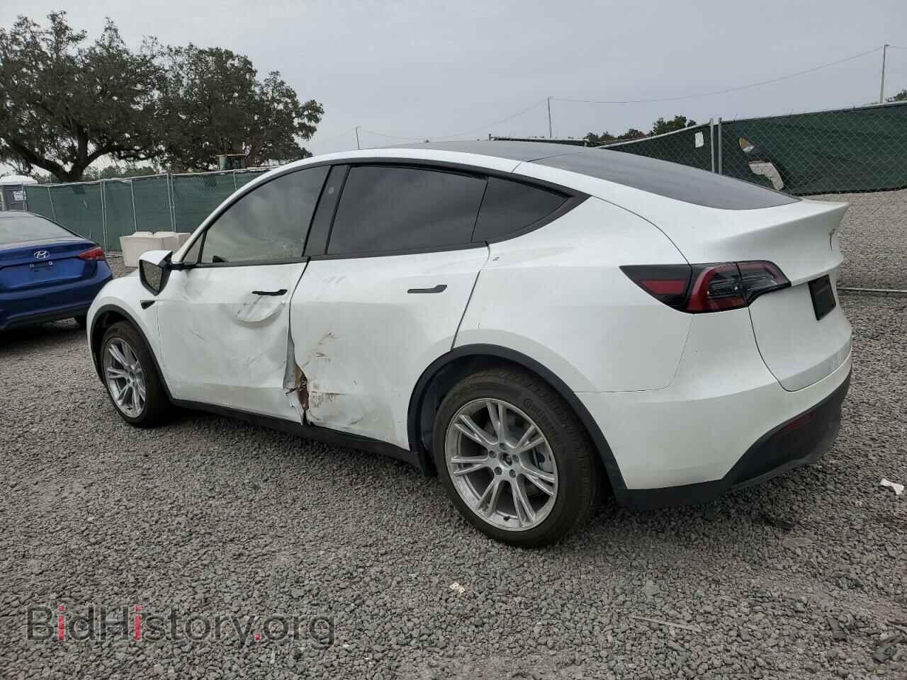 2023 TESLA MODEL Y - VIN: 7SAYGAEE2PF798881 - Фото 2