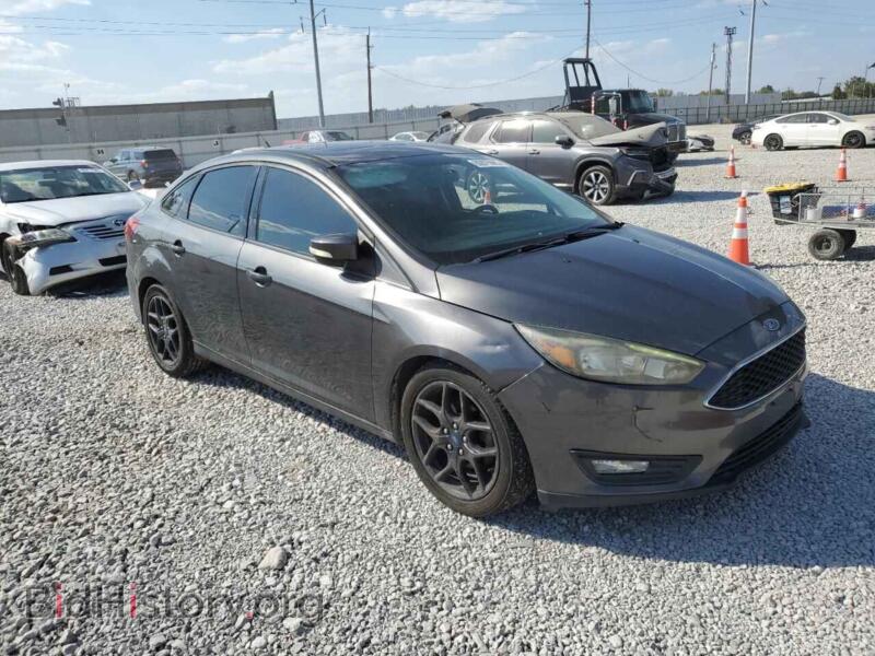 2016 Ford FOCUS (VIN 1FADP3F29GL328670) — фото 4 из 12