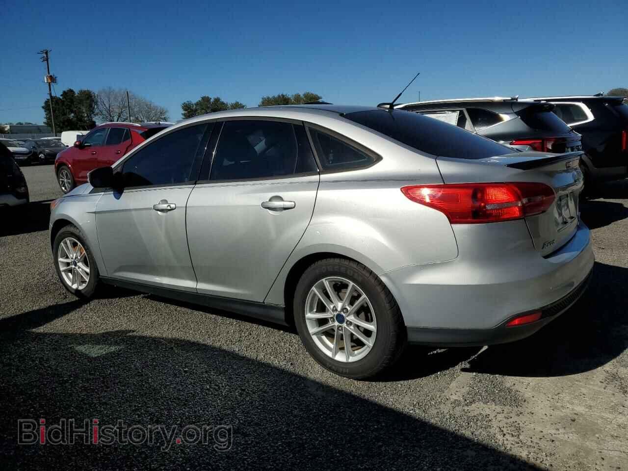 2016 FORD FOCUS - VIN: 1FADP3F25GL389840 - Фото 2